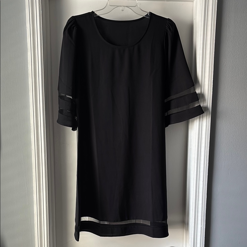 Elegant Black Dress with Sheer Sleeve Accents